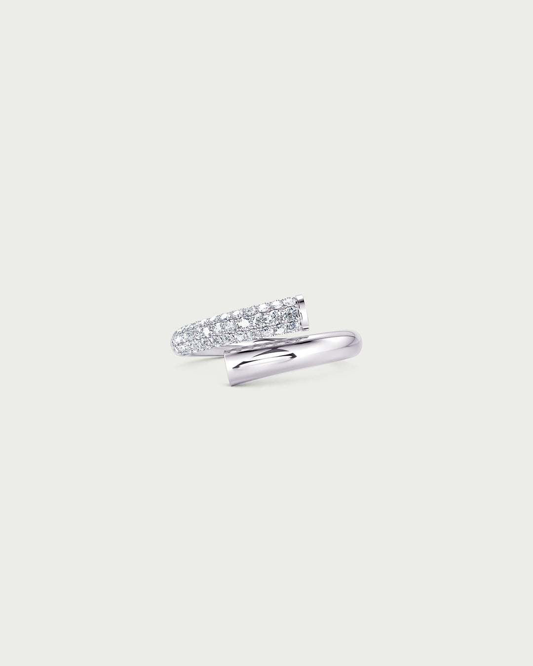 solo product shot of 18k white gold lab grown diamond wrap ring on off-white background